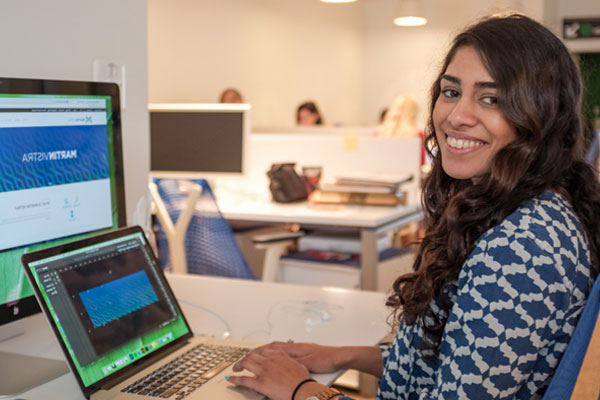 Magateer working at desk